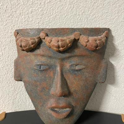 Handcrafted Ceramic Mask with Raised Ornamentation