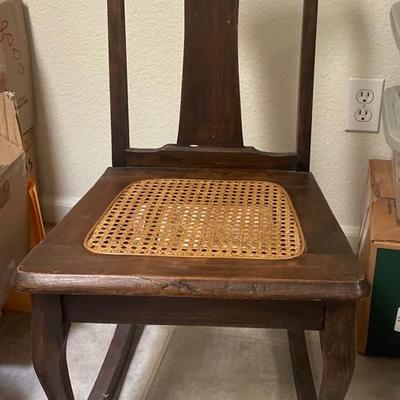 Wooden Rocking Chair with Cane Seat and Backrest Detail
