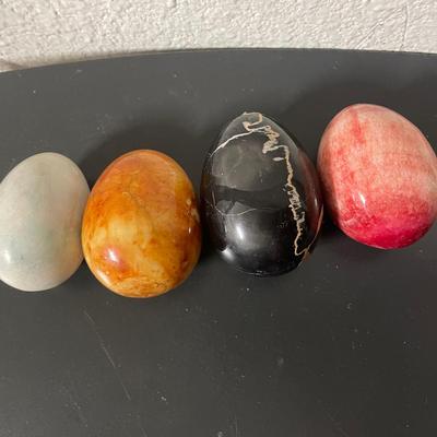 Polished Stone Eggs in Assorted Colors and Patterns