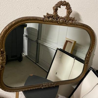 Ornate Wall Mirror with Gilt Wooden Frame and Floral Decorations