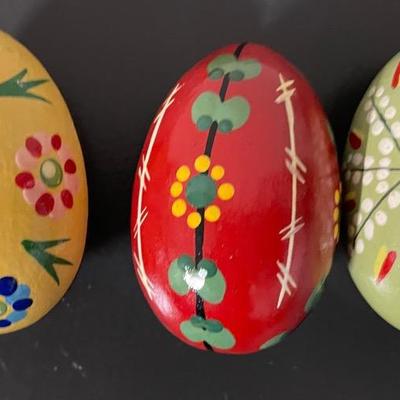 Three Hand-Painted Wooden Decorative Eggs with Floral Designs