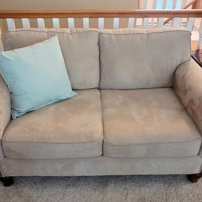 tan loveseat
