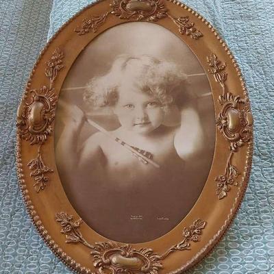 Wooden Oval Framed Artwork 