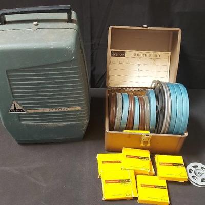 VINTAGE TOWER AUTOMATIC 8MM PROJECTOR AND FILM REELS