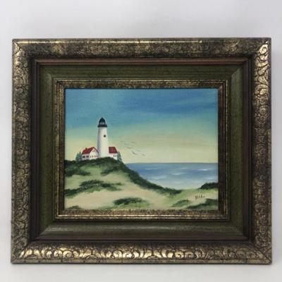 Framed Coastal Scene Signed "Hilda" – Lighthouse and Seabirds
