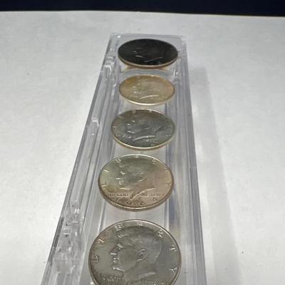 Four 1964 Kennedy Half Dollars & Ike 1972 Dollar Coin