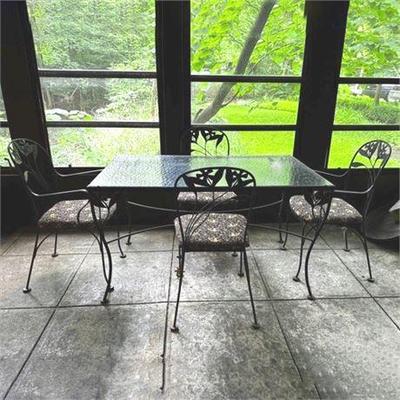 Lot 041   
Wrought Iron Patio Set in the Style of Woodard Furniture