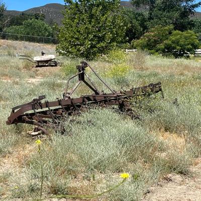 Sale Photo Thumbnail #201: Old tractor parts used as lawn art 