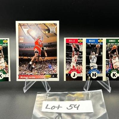Sale Photo Thumbnail #55: (4) Michael Jordan Basketball Cards Chicago Bulls
