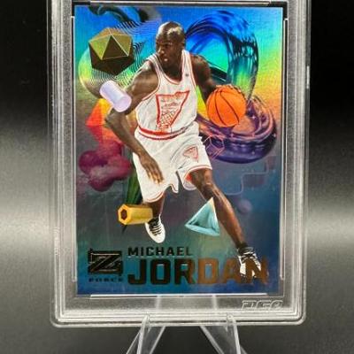 Sale Photo Thumbnail #25: Michael Jordan Graded Basketball Card Metal Insert Card - 8.5 Near Mint +
