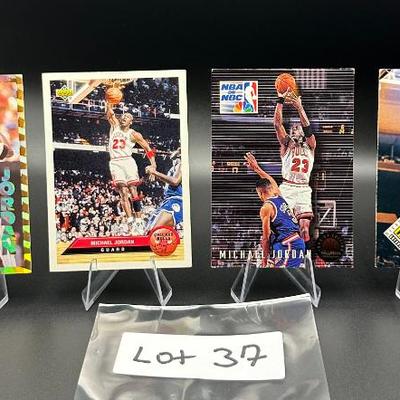 Sale Photo Thumbnail #38: (4) Michael Jordan Basketball Cards Chicago Bulls
