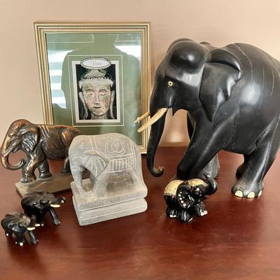 Eclectic Elephant Figurine Collection with Buddha Art
