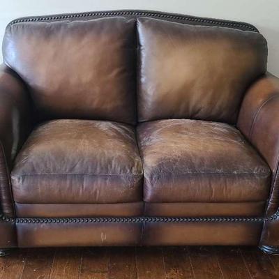 Brown Leather-Like Loveseat with Nailhead Trim