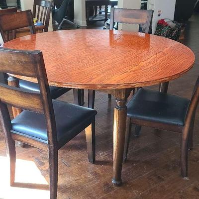 Round Wooden Table with Four Chairs 