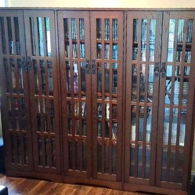 Wooden Bookcase With Glass-Paneled Doors