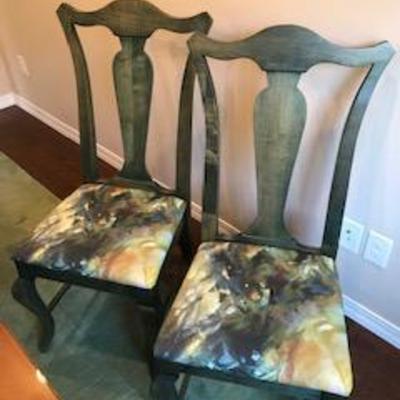 Modern twist on a Chippendale style-four dining chairs