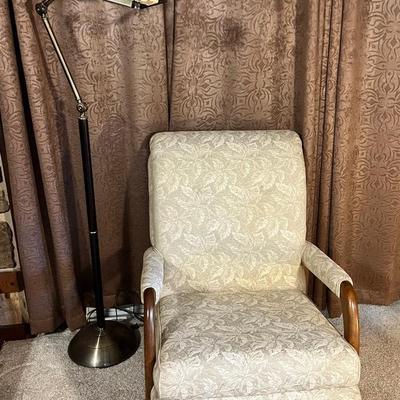 Mid-Century Upholstered Rocking And Swivel Chair And Brass-like Lamp
