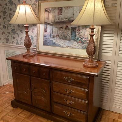 Wood Sideboard with Lamps and Framed Art