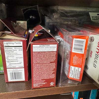Assorted Light Bulbs, Batteries, and Hardware Items