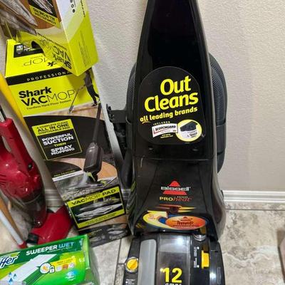 Bissell ProHeat Shampooer, Shark VacMop, and Swiffer Sweeper