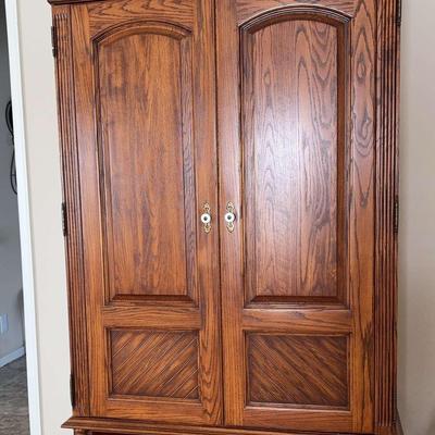 Entertainment Armoire with TV, Blu-ray 3D Disc Player, Tape Player, and Remotes 79”x42”x19”