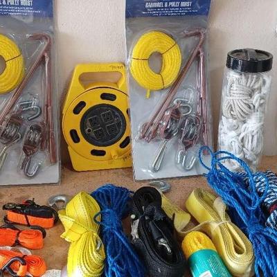 Large Lot of Gambrel & Pulley Hoists,Tow Straps, Utility Ropes, LED Work Lights, and Power Cord Reel