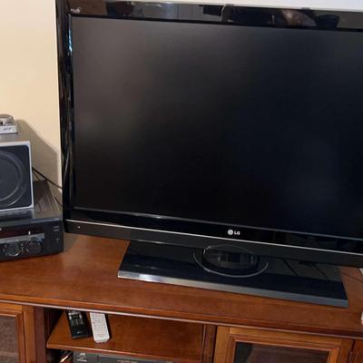 LG 53” HD TV, Wooden Cabinet, Logitech Speakers, Sony Video Control Center & More