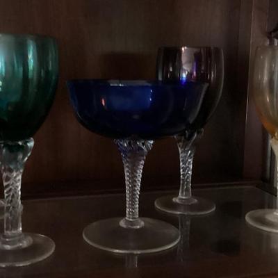 Colored wine or water glasses with twisted stems