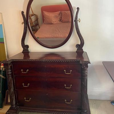 Mahogany Dresser with Oval Mirror and Carved Details