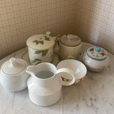 Ceramic Teapots, Sugar Bowls, and Creamers with Decorative Designs