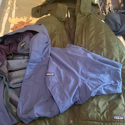 Two Patagonia Hooded Jackets in Blue and Green, Sizes L and XL