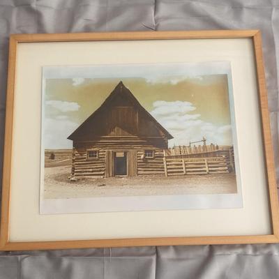 Framed Print of a Rustic Cabin with Sepia Tones