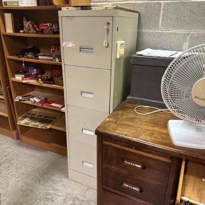 Sale Photo Thumbnail #310: Four door file cabinet with lock and key