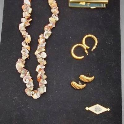 Assorted Jewelry Pieces and Cosmetic Mirror