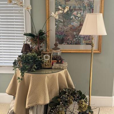 Floral Framed Print, Brass Floor Lamp, and Skirted Side Table