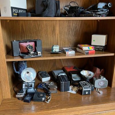 Antique cameras including a Brownie Kodak