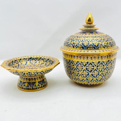 Lot #61 - Two pc. Benjarong porcelain ware features hand-painted enamel decoration with gold accents and pedestal bowl/stand