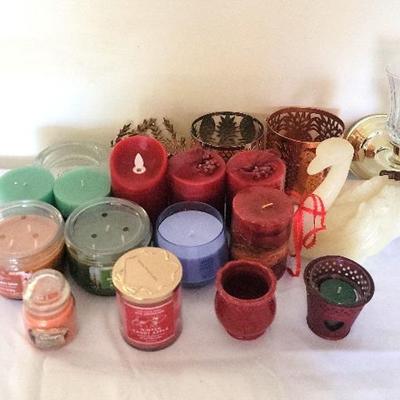 Assortment of Candles and Candle Holders