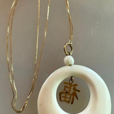 14K Yellow Gold Delicate 18" Necklace With Carved Bone Pendant - Total Weight 6.2 Grams 