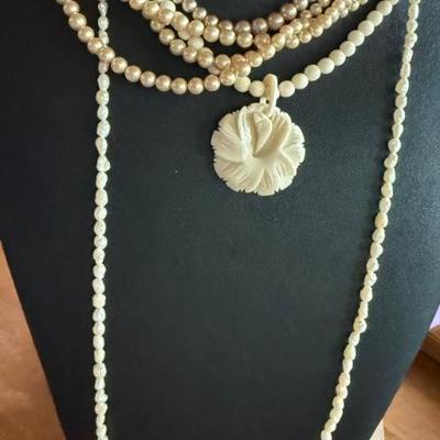 (1) Fresh Water Pearl 30 Inch (2) Faux Pearl 3 Strand & Single Strand (1) Carved Bone Flower Necklace