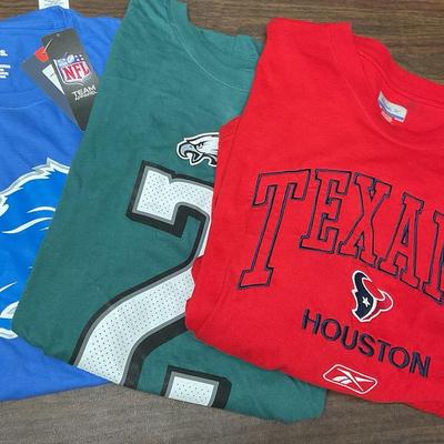 “Nike,” “Reebok,” & “Fanatics” T-Shirts