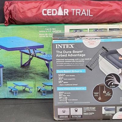 Rugged Exposure Portable Picnic Table, Cedar Trail 2-Person Dome Tent, And Intex Mid-Rise Airbed