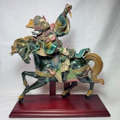 Sale Photo Thumbnail #78: Chinese Ming-style glazed pottery figural roof tile of a horse and warrior mounted on wood stand, signed, handmade, 13“ x 5“ x 14“