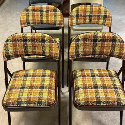 6 Folding Chairs, 4 Matching