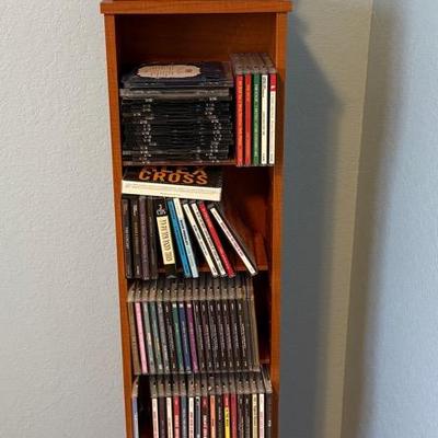 CD/DVD Shelf With CD’s And Horse Statue