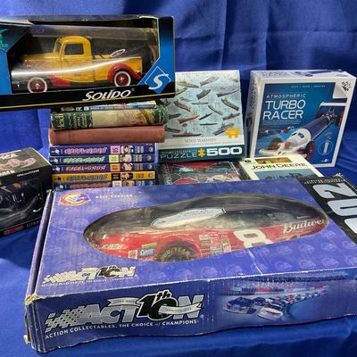 Kids Puzzles, Excel Saga Books, NASCAR, And Battleship Galactica 
