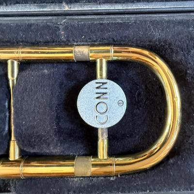 Conn trombone and case