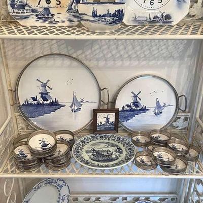 Antique German porcelain plate/clocks with several blue delfts plates, serving trays and coasters