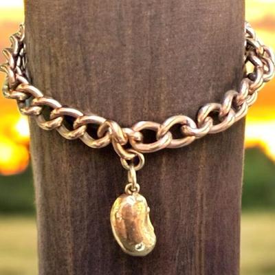 Antique curb bracelet with lucky bean" charm