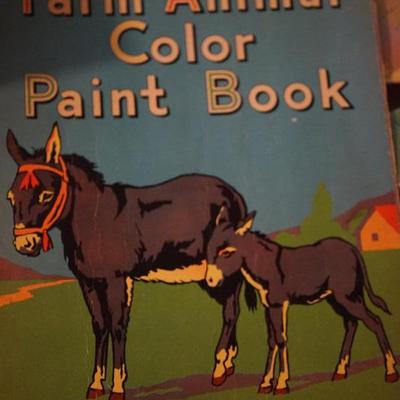 Assortment of vintage children's books and activity books, Little Golden books, and more.